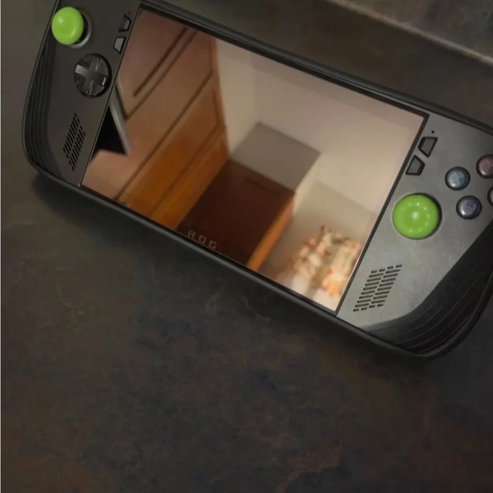 Handheld Gaming Console with Vibrant Green Highlights